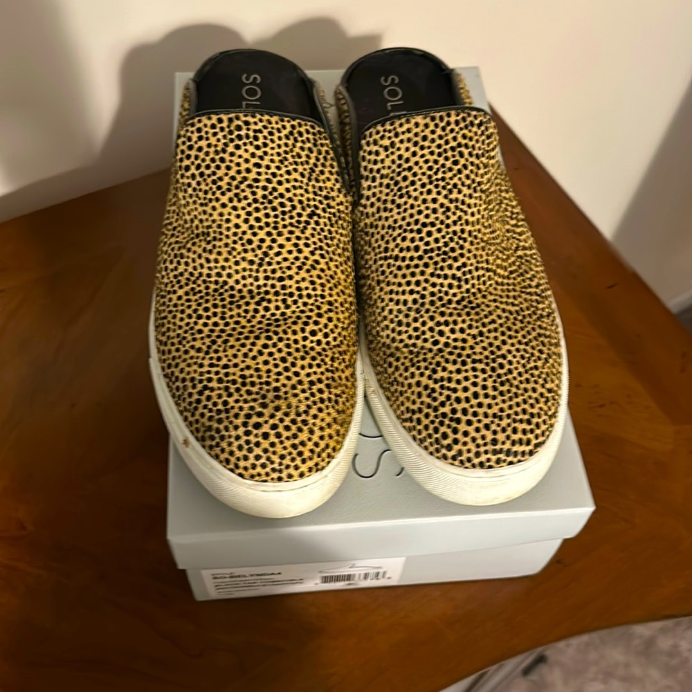 Sole Society black and gold fur slides.
